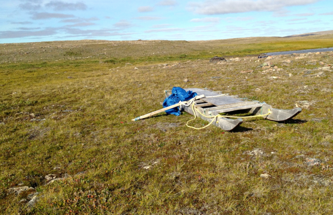 Sled on the tundra: waiting for winter.