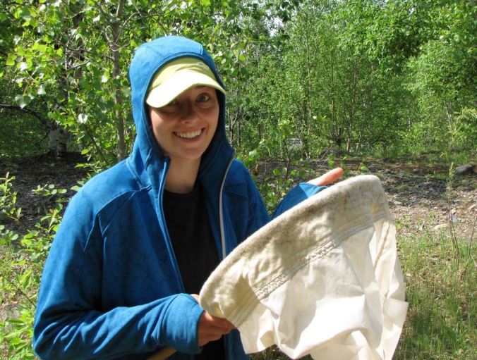 Sarah, with a butterfly net.