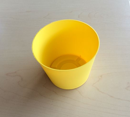 A yellow pitfall trap - the kind used in Greenland, and the one we recommend for future monitoring in Canada's Arctic.